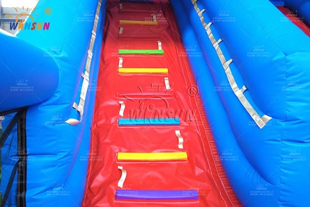 Jungle-themed inflatable slide with bounce area for back-to-school events