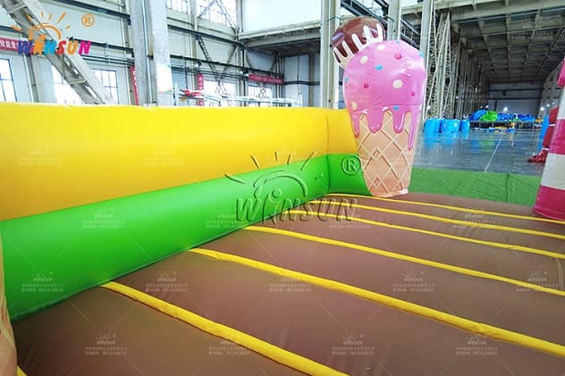 large candy themed inflatable dry slide