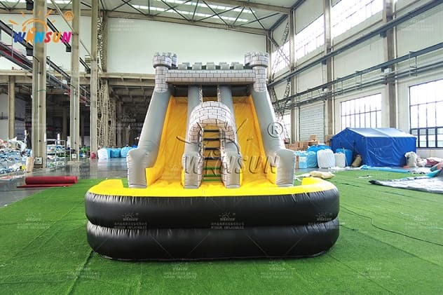 castle-themed inflatable water slide