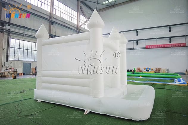 White color inflatable bounce house with slide