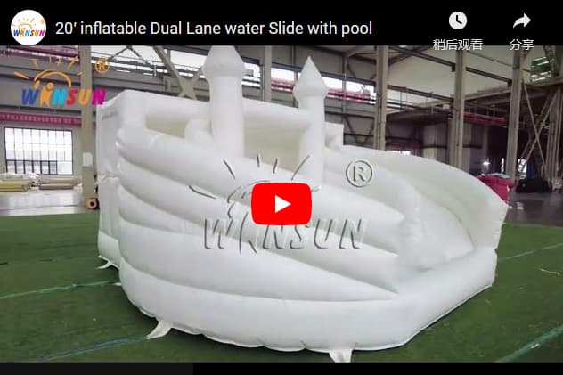 White inflatable water slide with pool